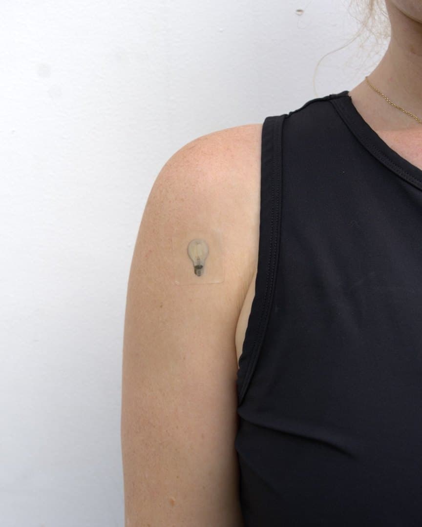 A FOCUS Daily Stick patch worn on the shoulder